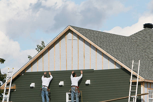 Professional Siding Replacement technician working in Columbia, IL